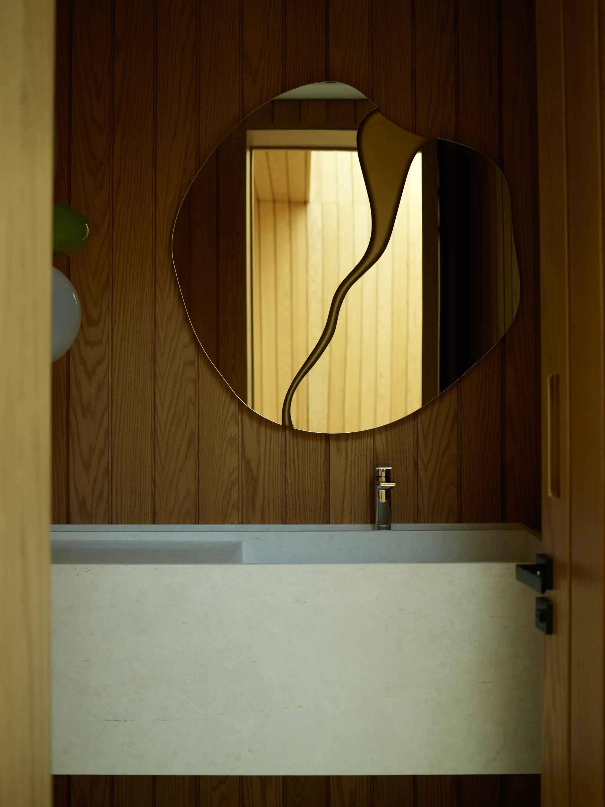 Warm hand-finished walls in a quiet, enclosed interior of the Broadview residence by LUXOM
